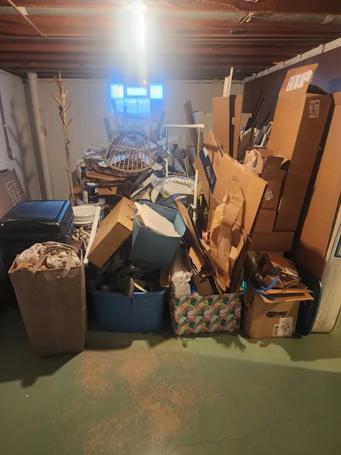 Roll-off dumpster container at job site for Construction Dumpster Rental in Red Wing